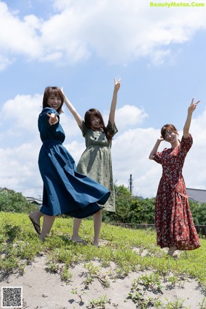 A group of young women are playing in the water.