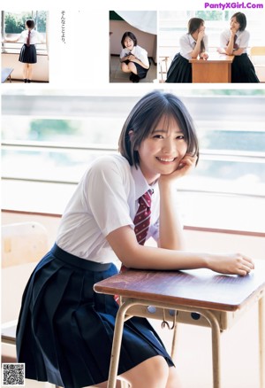 A young woman in a school uniform posing for a picture.